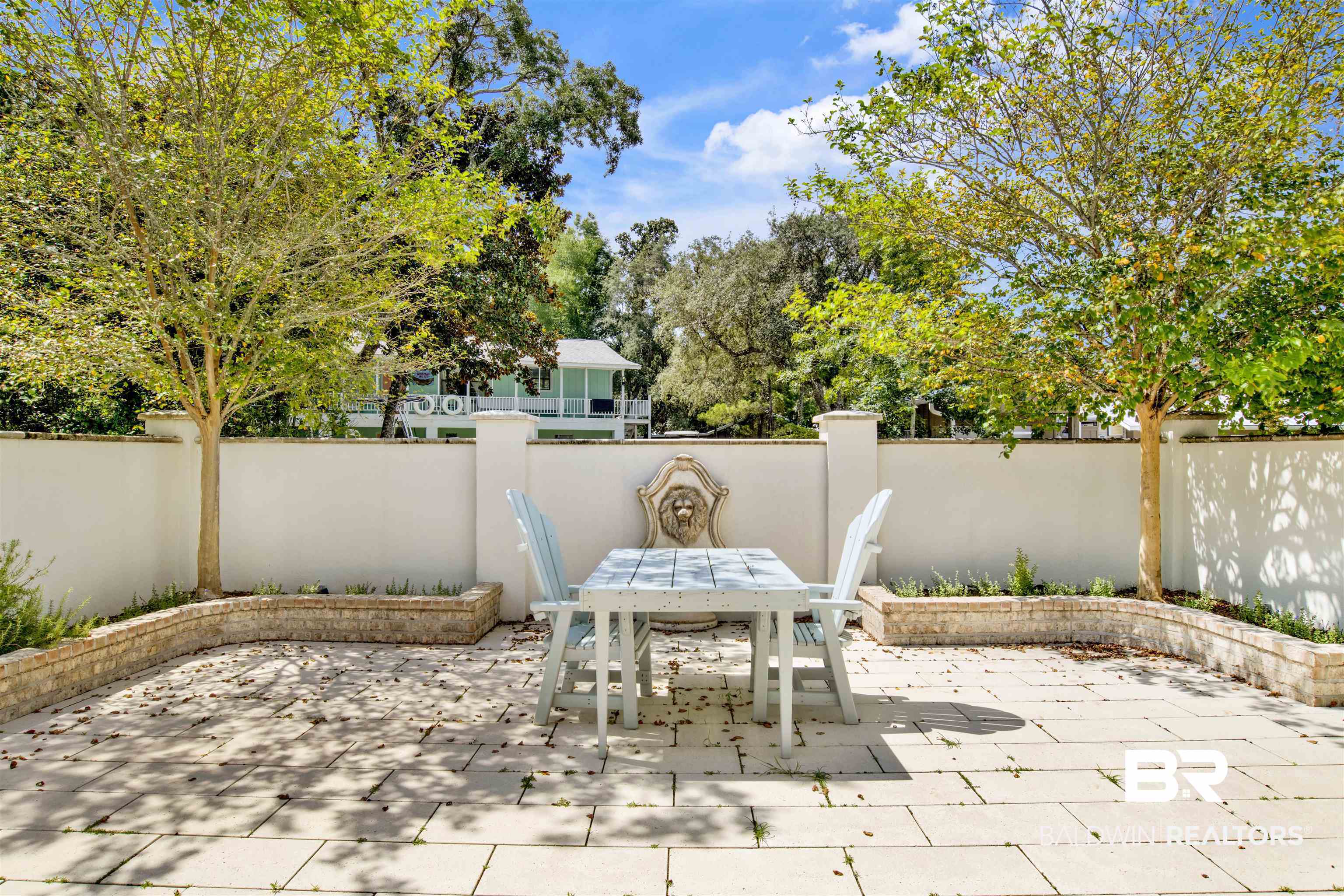 27980 Canal Road Orange Beach, AL 36561 - Photo 10 of 46 Fenced backyard featuring outdoor dining area and a patio area