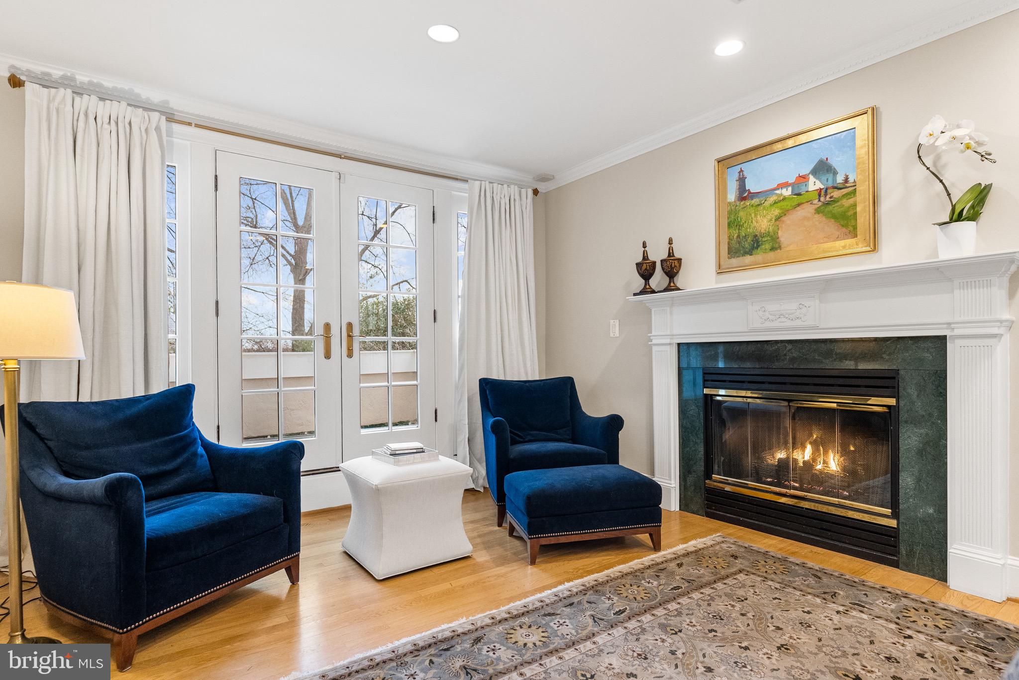 4545 Klingle Street Northwest Washington, DC 20016 - Photo 11 of 19 Siting area with gas fireplace and terrace