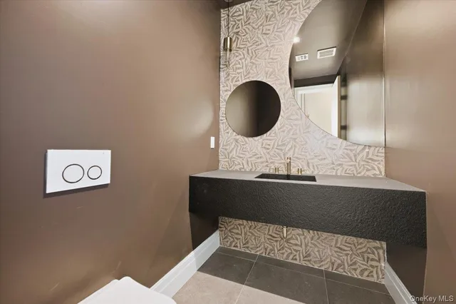 $2,595,000 | 132 Park Street, Woodmere, NY 11598