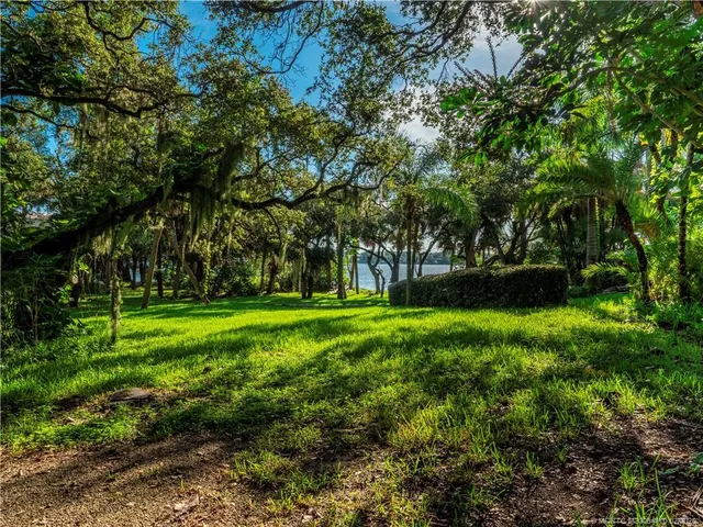 a view of outdoor space with deck and yard