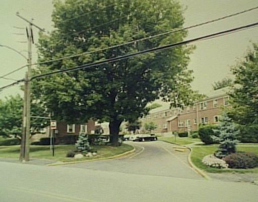 180 Glenbrook Road, Unit 48 Stamford, CT 06902 - Photo 1 of 1 a view of a city street with a building