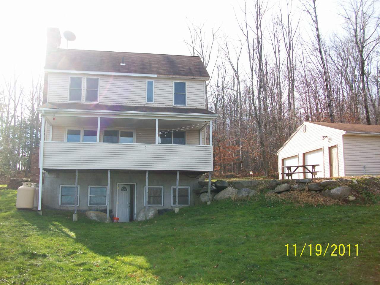 34 Maynard Road Chester, MA 01011 - Photo 5 of 11 a large building with a big yard and more windows