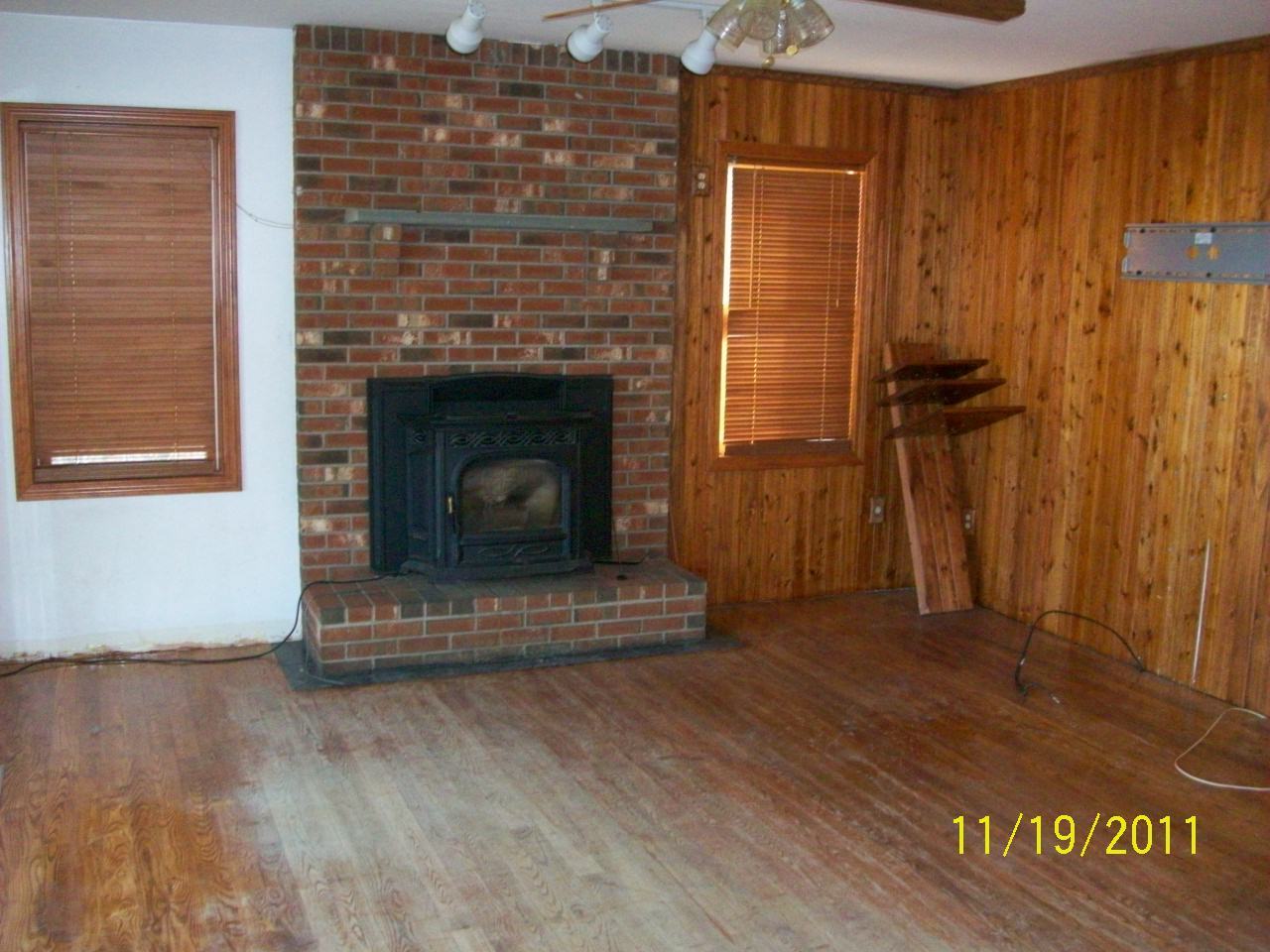 34 Maynard Road Chester, MA 01011 - Photo 10 of 11 a living room with a fireplace