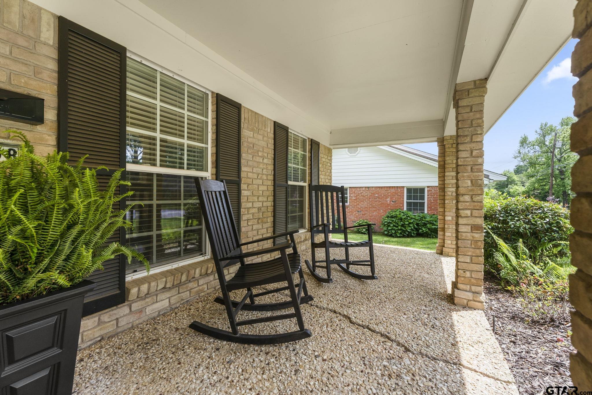 3608 Pollard Drive Tyler, TX 75701 - Photo 14 of 14 a view of a chair and table in the patio