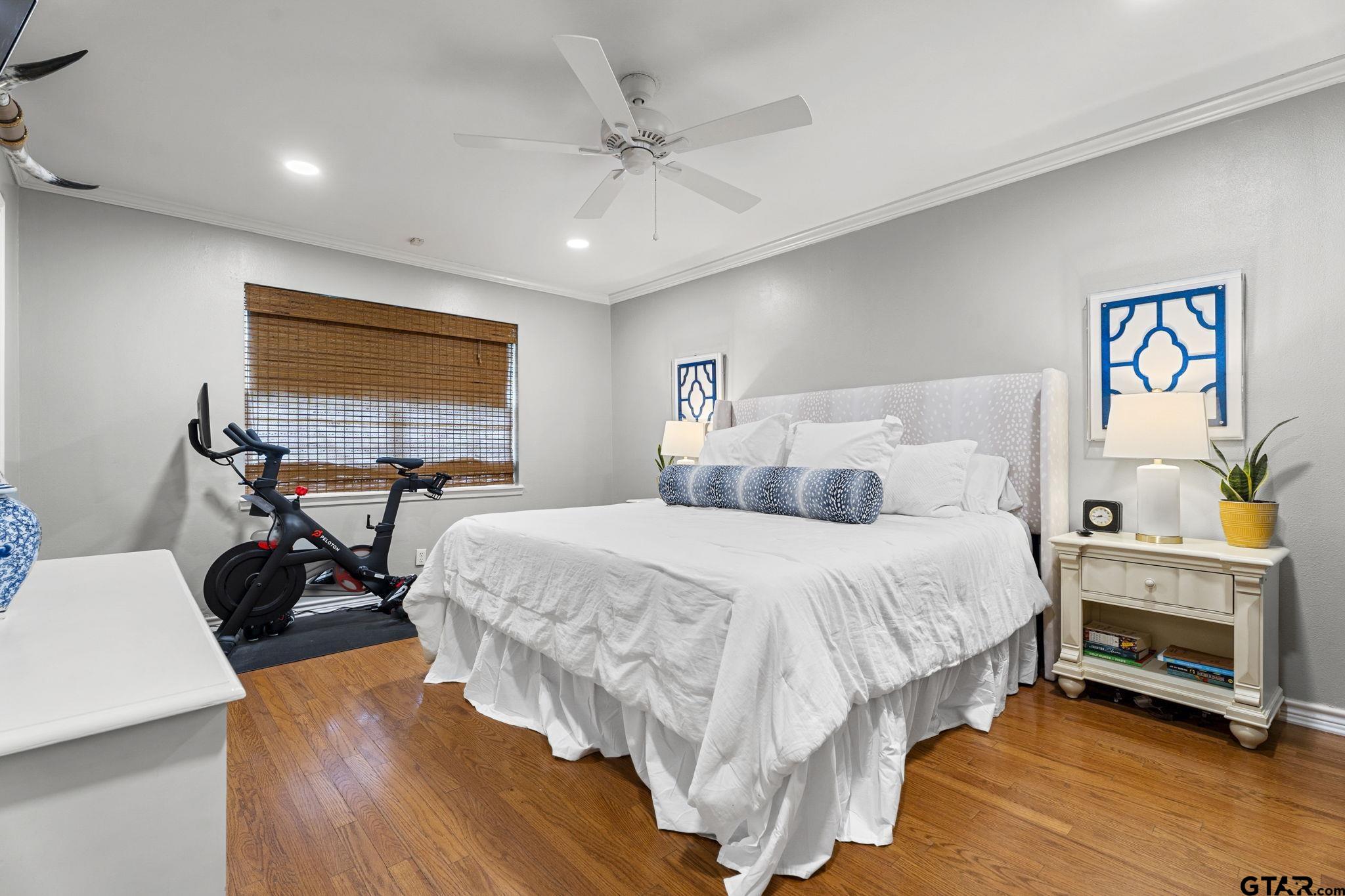3608 Pollard Drive Tyler, TX 75701 - Photo 7 of 14 a bed room with a bed and a chair