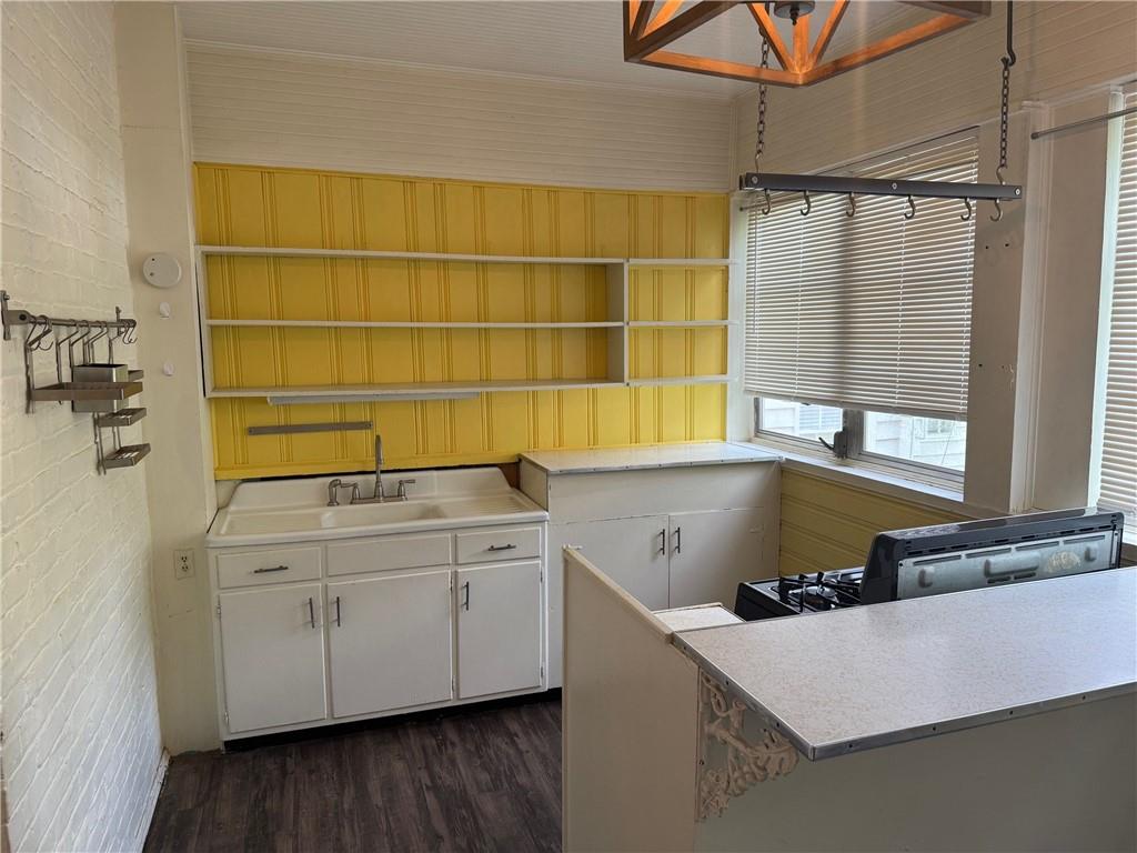 846 Briarcliff Road Northeast Atlanta, GA 30306 - Photo 5 of 22 a room with a window a sink and a mirror
