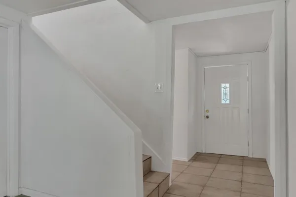 a view of an entryway with staircase