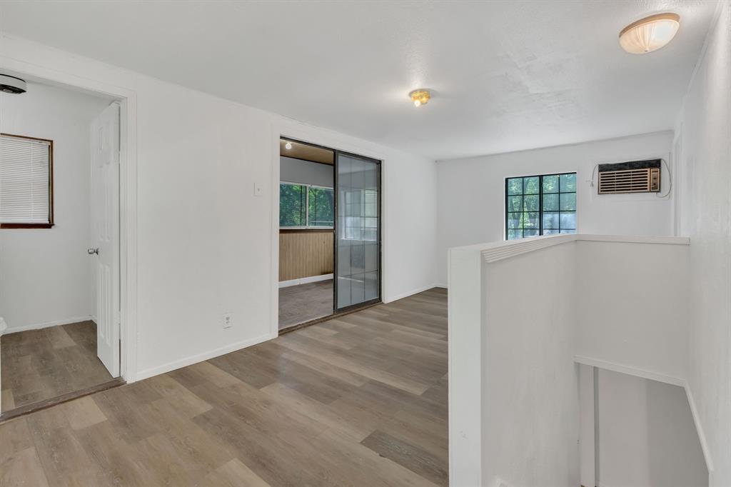 84 Natchez Road Pottsboro, TX 75076 - Photo 18 of 37 an empty room with windows and closet