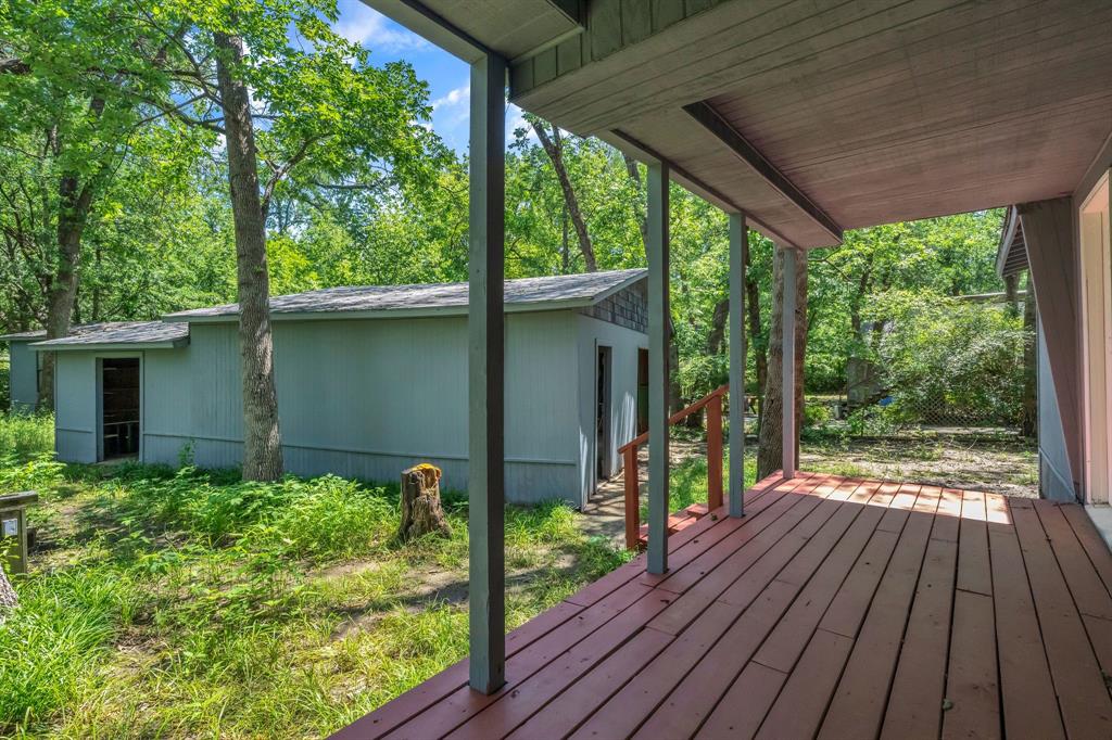 84 Natchez Road Pottsboro, TX 75076 - Photo 31 of 37 a front view of a house with garden