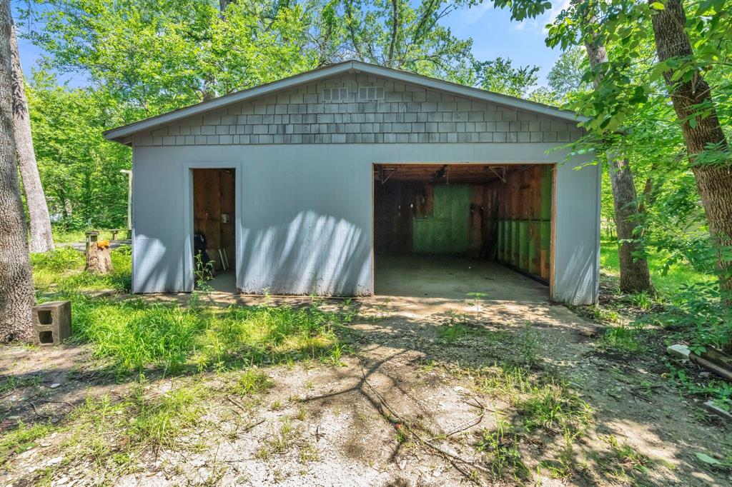 84 Natchez Road Pottsboro, TX 75076 - Photo 33 of 37 a front view of a house with garden