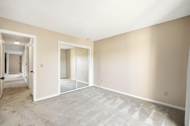1067 Padre Drive, Unit 2 Salinas, CA 93901 - Photo 16 of 24 an empty room with a bathroom and a sink