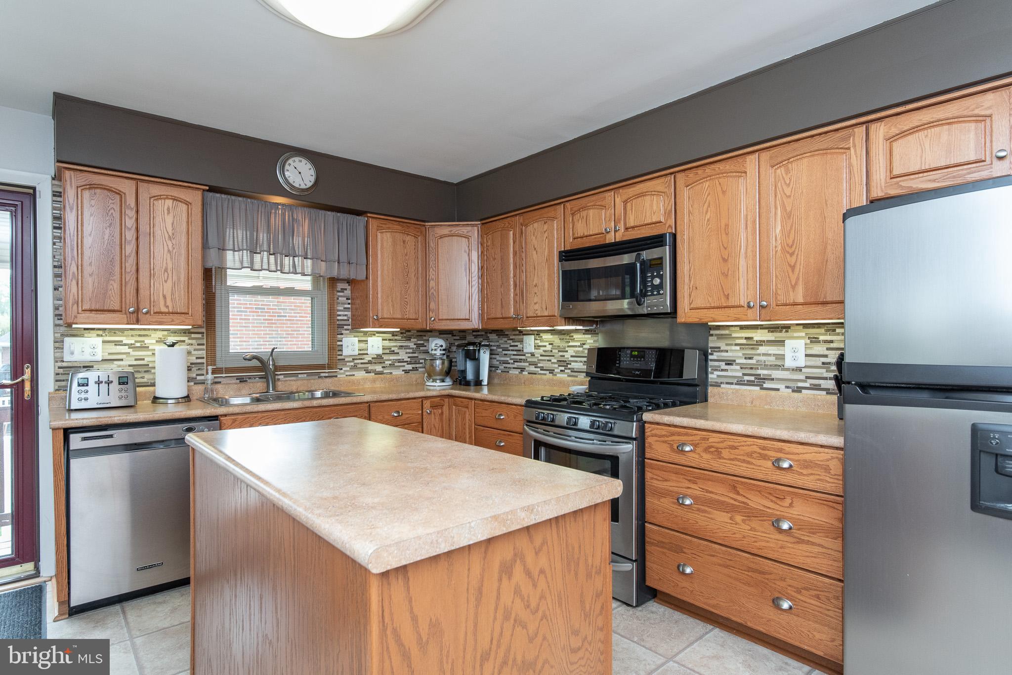 4310 Camellia Road Baltimore, MD 21236 - Photo 21 of 55 Updated Kitchen center island
