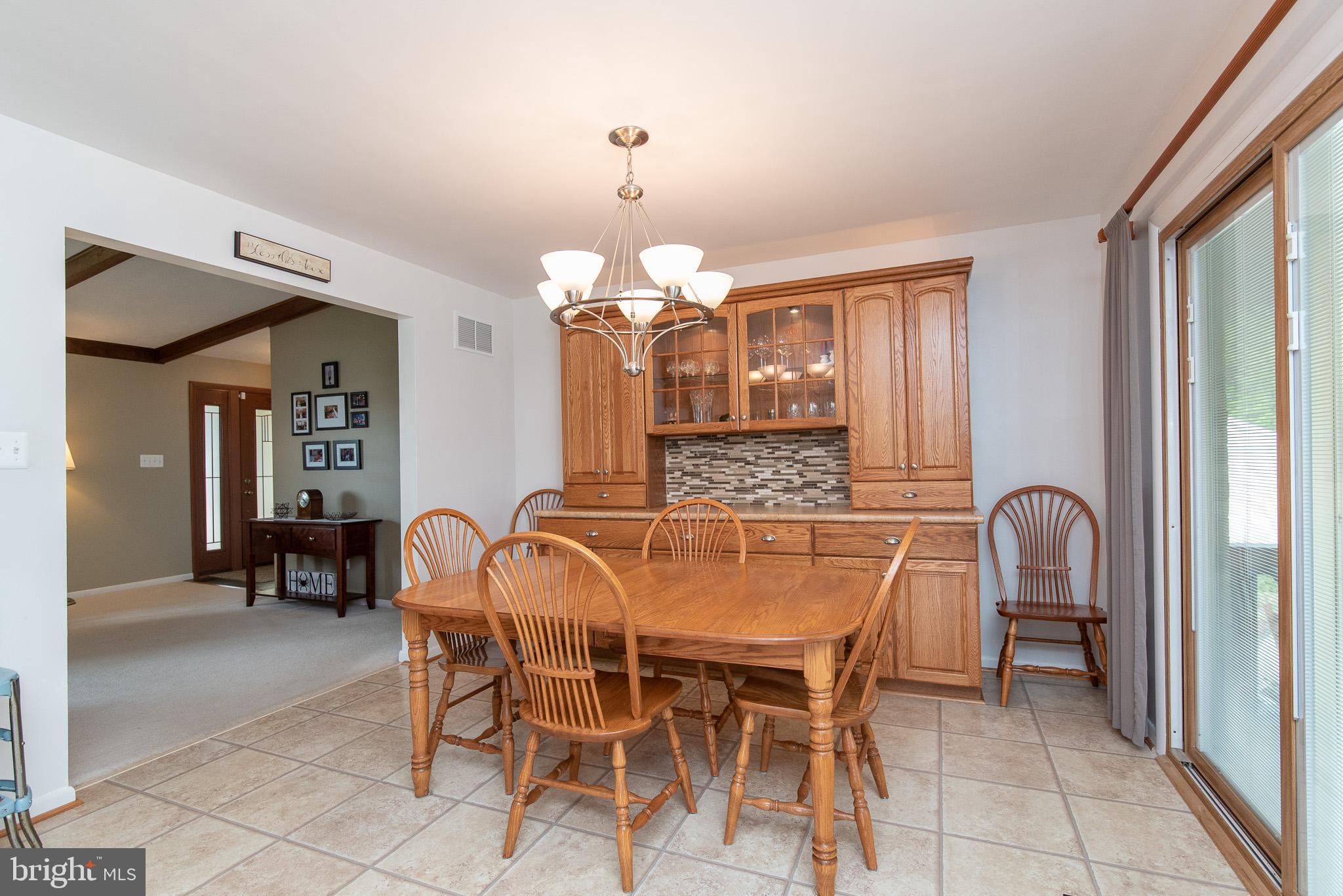 4310 Camellia Road Baltimore, MD 21236 - Photo 4 of 55 Breakfast /Dining Area w/Sliders to Covered Deck