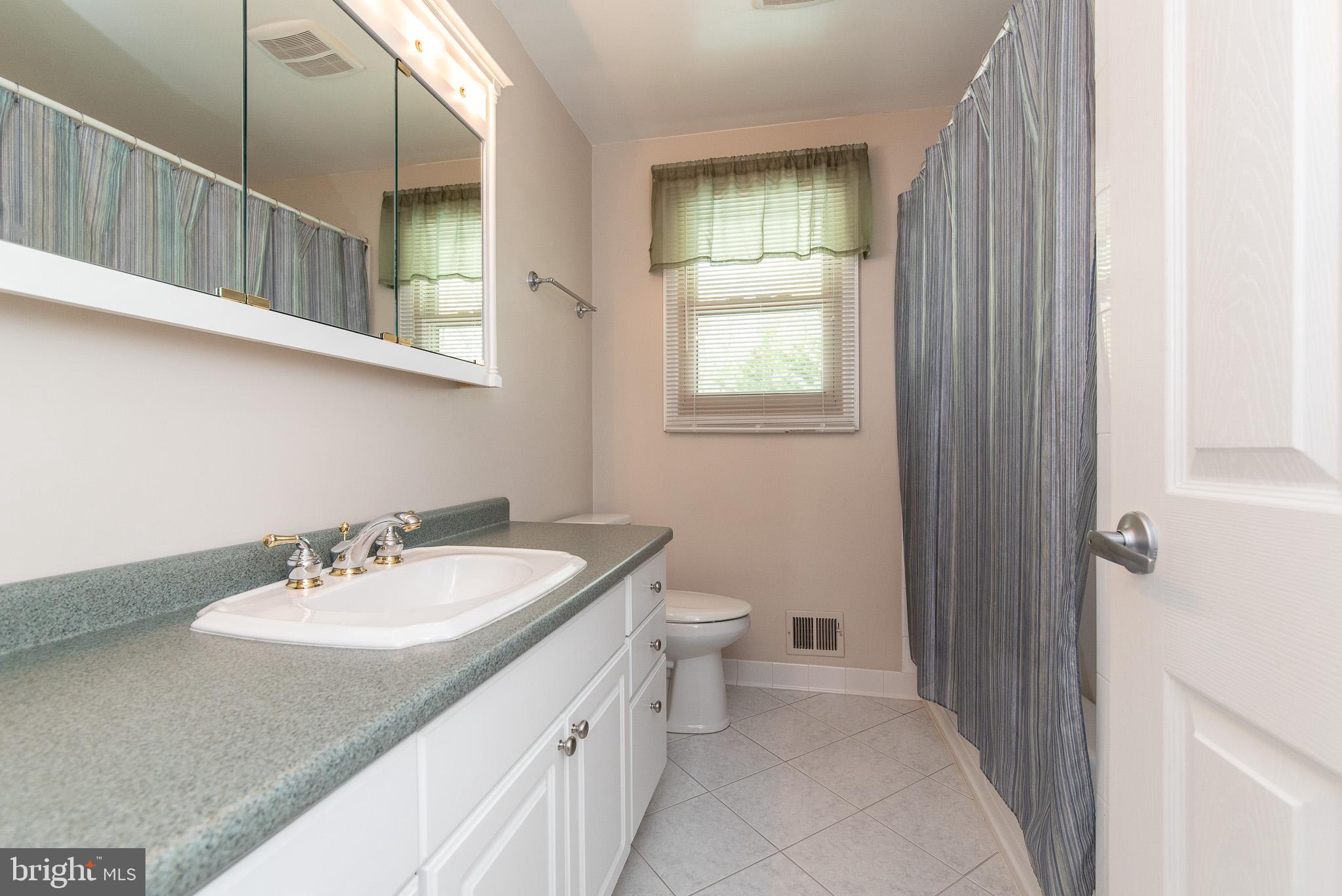 4310 Camellia Road Baltimore, MD 21236 - Photo 33 of 55 Updated Main Level Hall Bath