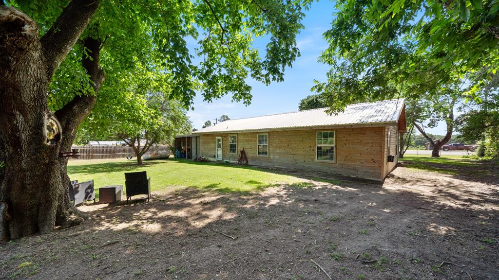 29080 Highway 19 Athens, TX 75752 - Photo 22 of 30 a front view of a house with a yard and garage