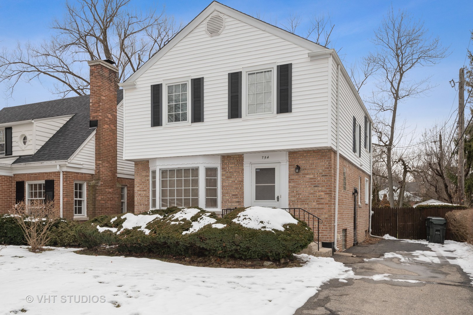 734 Beaver Road Glenview, IL 60025 - Photo 2 of 26 a front view of a house with a yard
