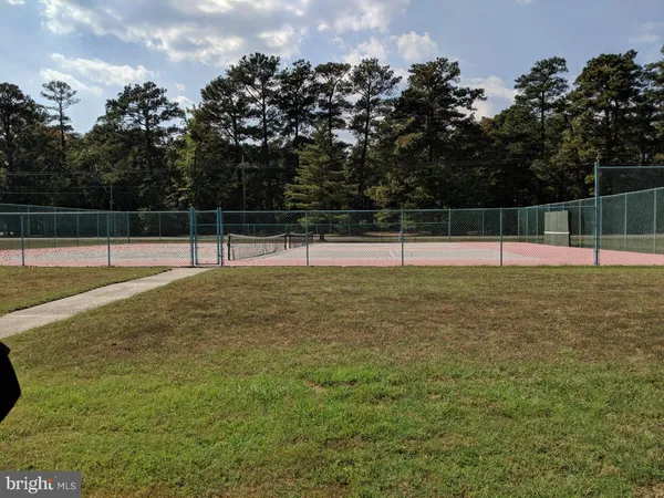 a house view with a play ground