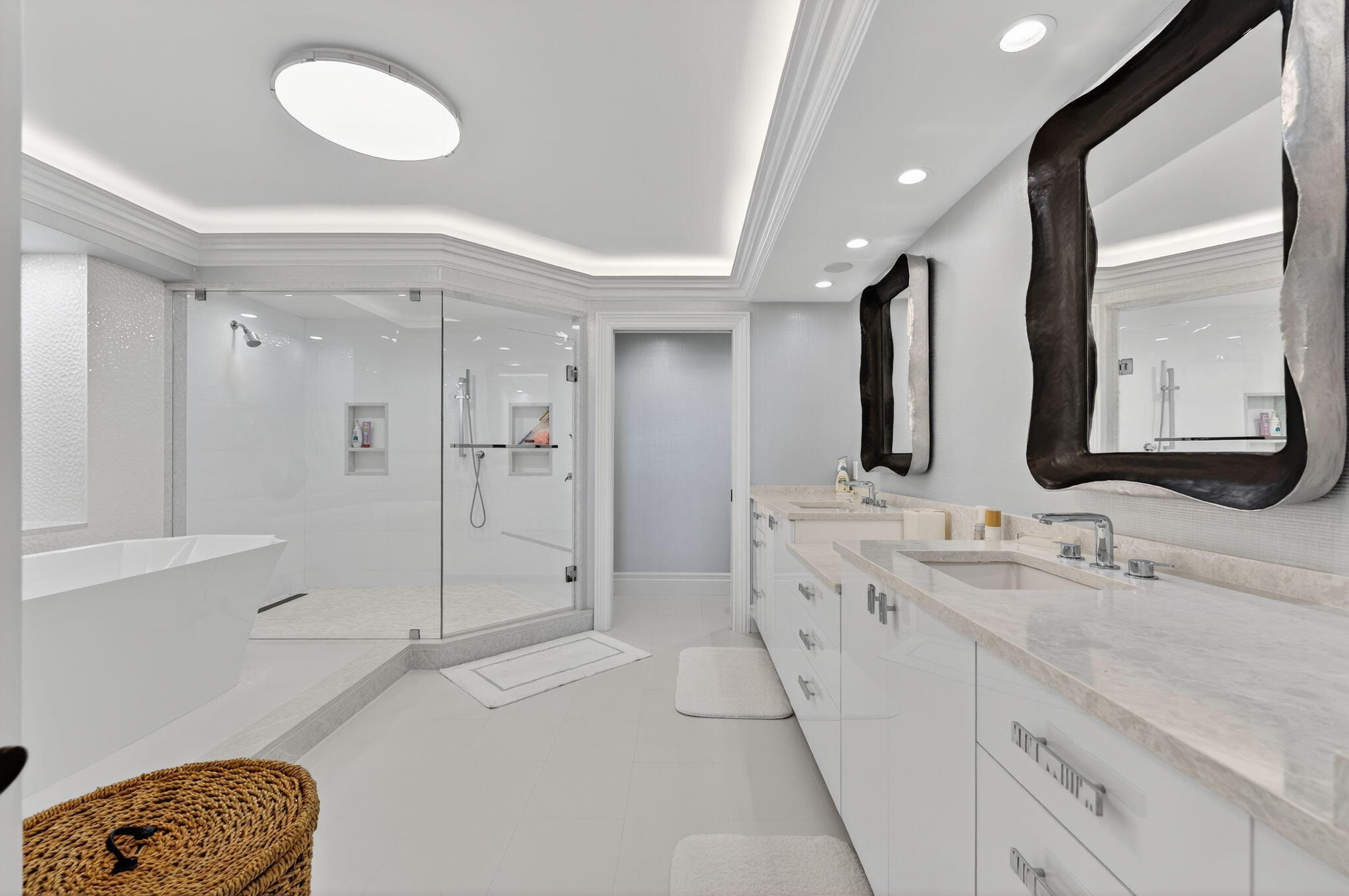 1400 South Ocean Boulevard, Unit 605 Boca Raton, FL 33432 - Photo 23 of 77 a spacious bathroom with a double vanity sink mirror and shower