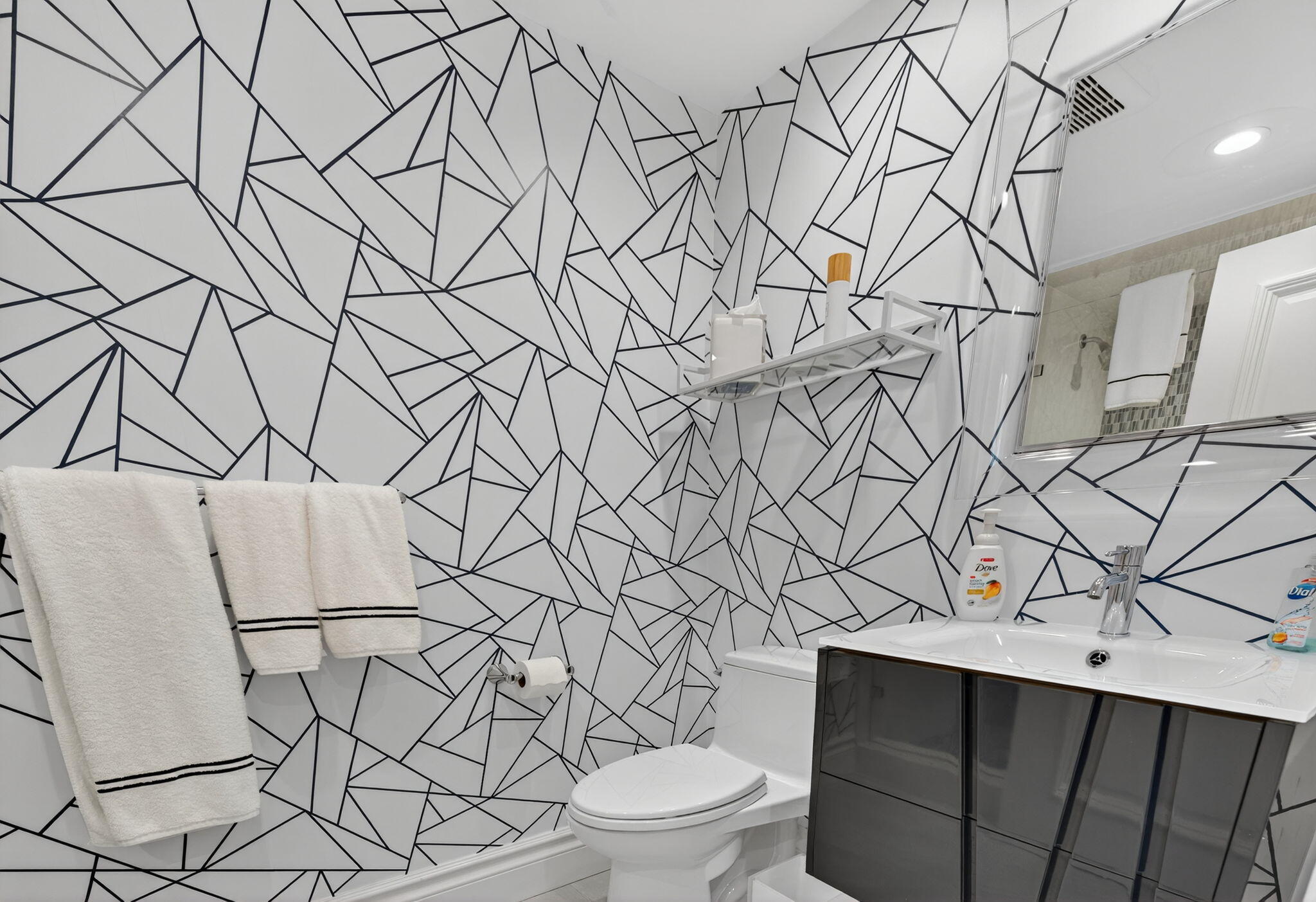 1400 South Ocean Boulevard, Unit 605 Boca Raton, FL 33432 - Photo 28 of 77 a bathroom with a toilet and a sink