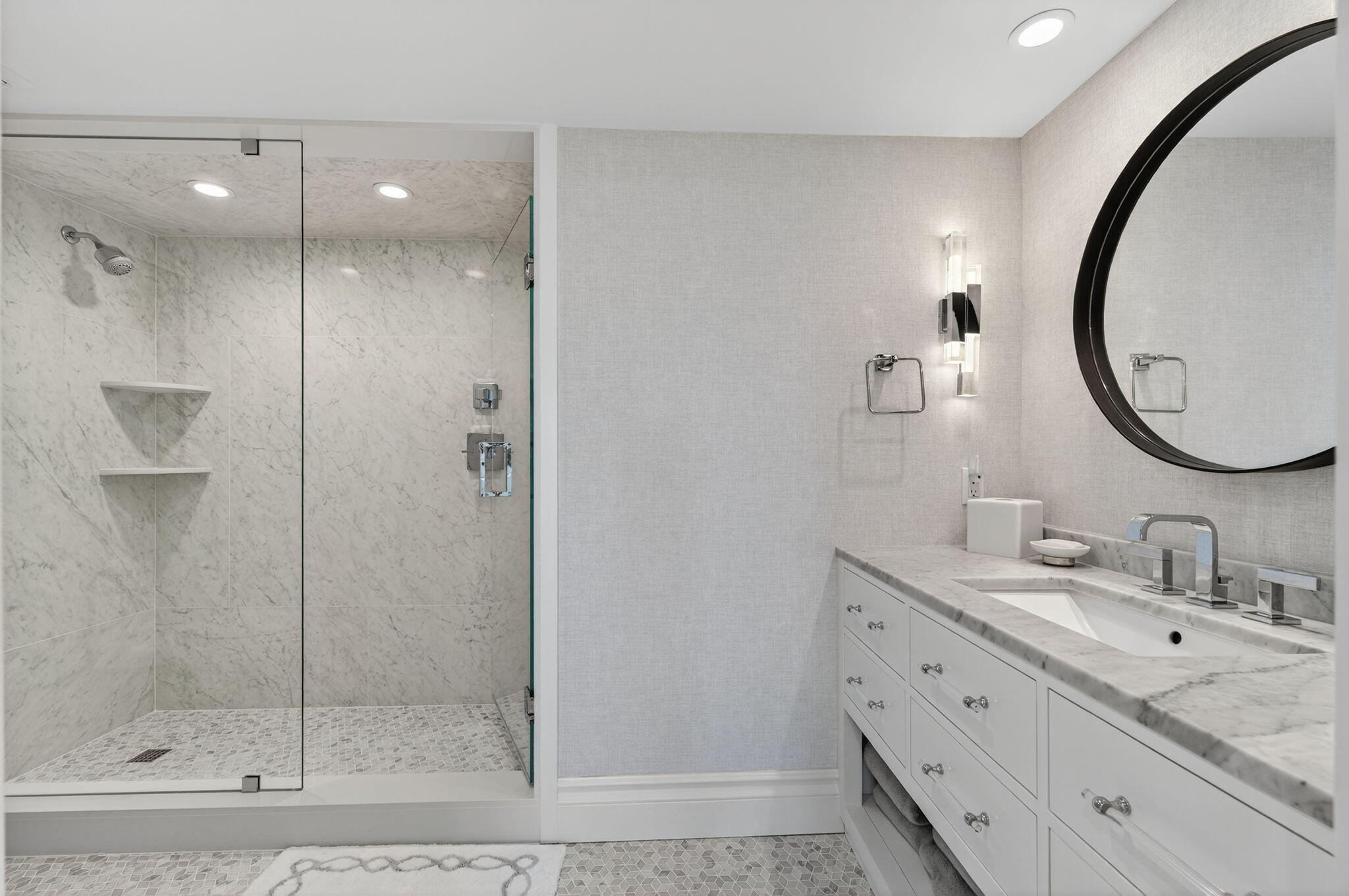 1400 South Ocean Boulevard, Unit 605 Boca Raton, FL 33432 - Photo 35 of 77 a bathroom with a sink a toilet and a mirror