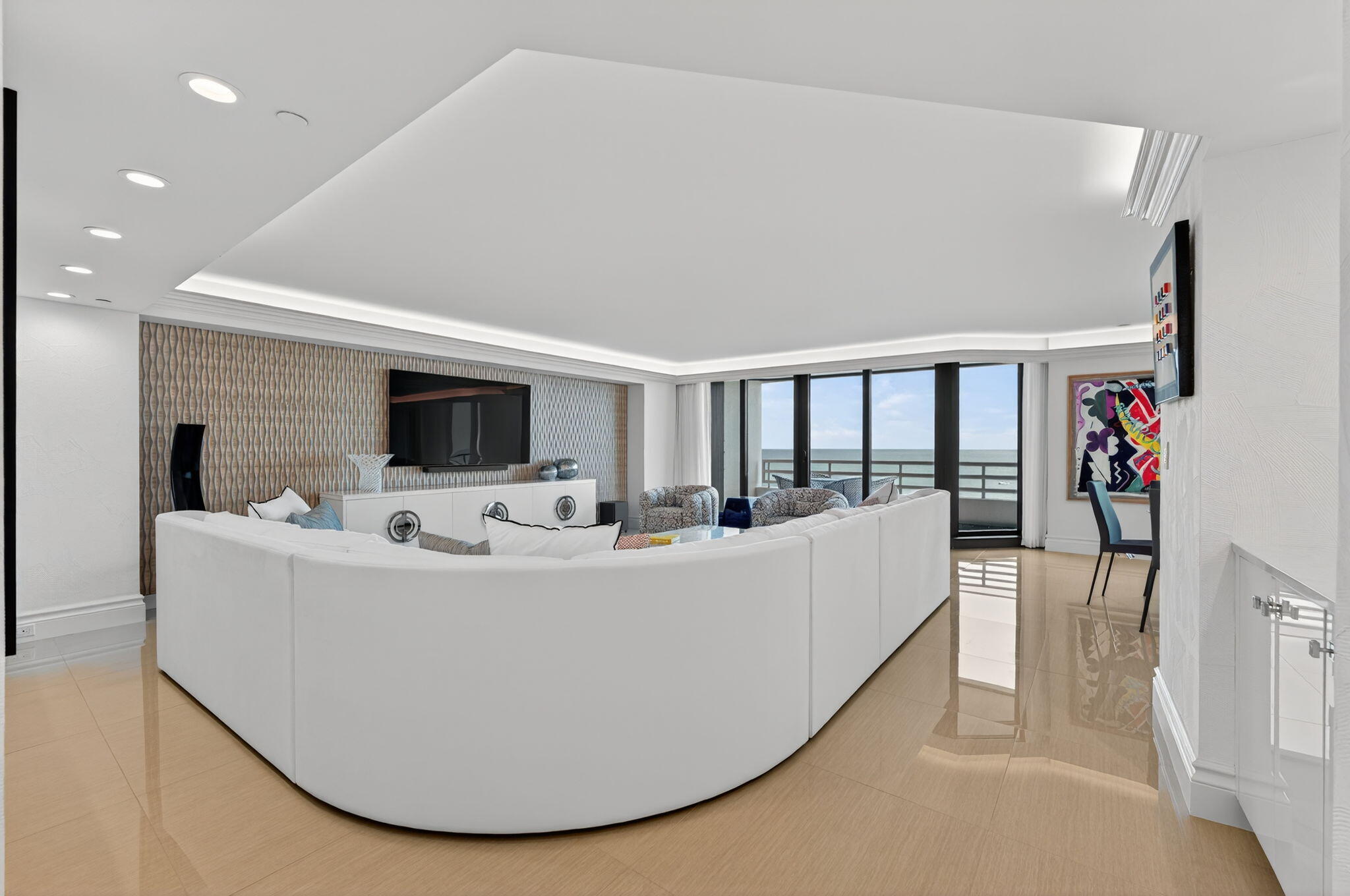 1400 South Ocean Boulevard, Unit 605 Boca Raton, FL 33432 - Photo 4 of 77 a living room with furniture and a flat screen tv