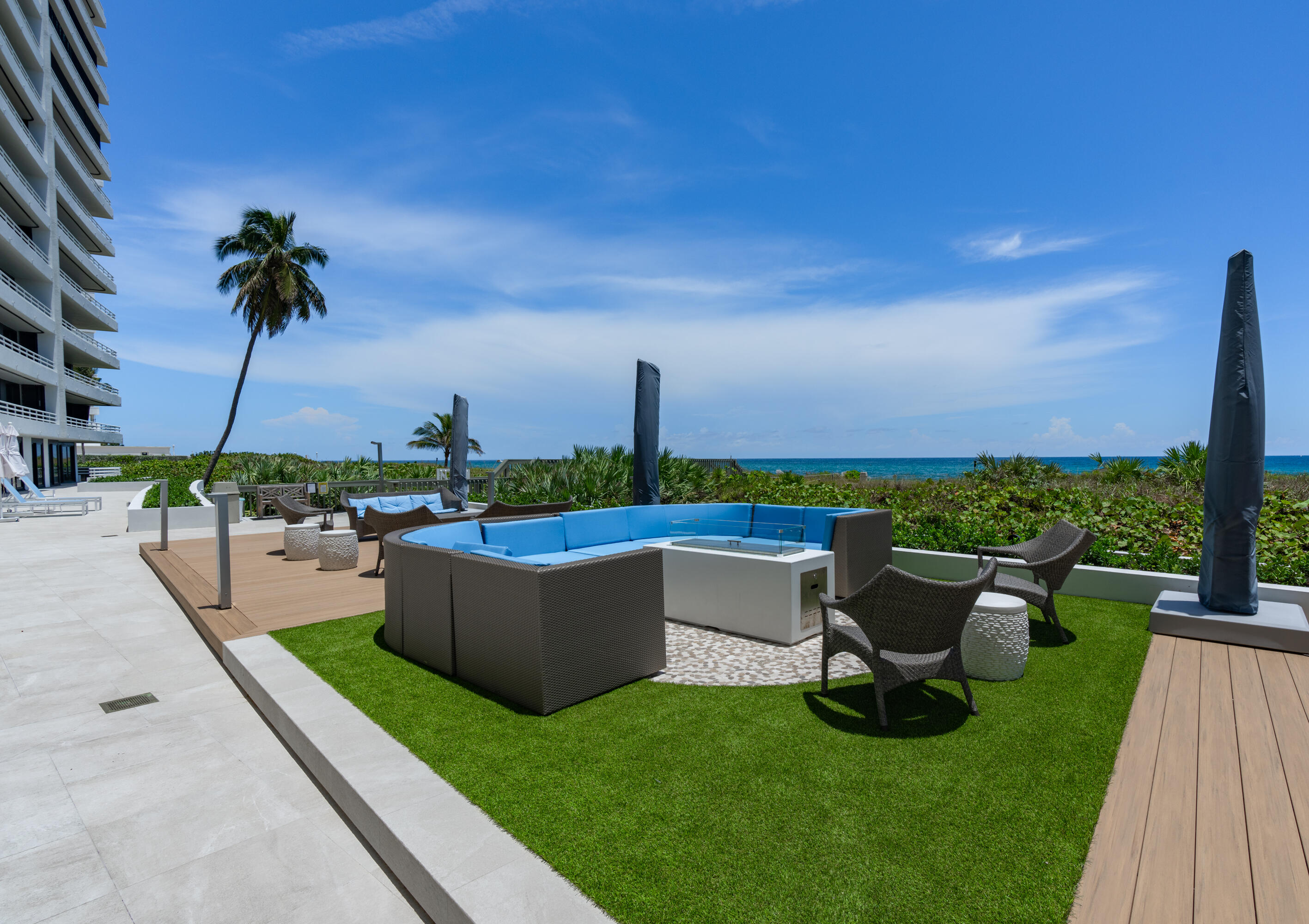 1400 South Ocean Boulevard, Unit 605 Boca Raton, FL 33432 - Photo 59 of 77 a swimming pool with outdoor seating and yard
