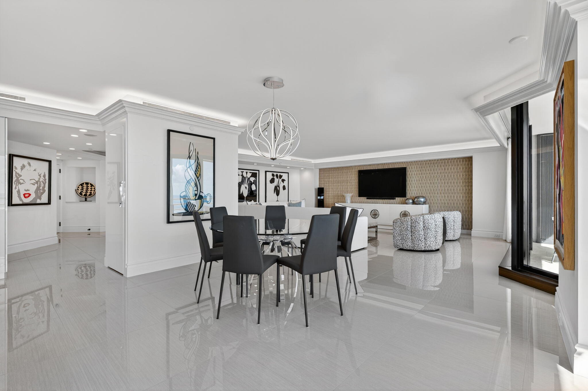 1400 South Ocean Boulevard, Unit 605 Boca Raton, FL 33432 - Photo 9 of 77 a view of a livingroom with furniture and a flat screen tv