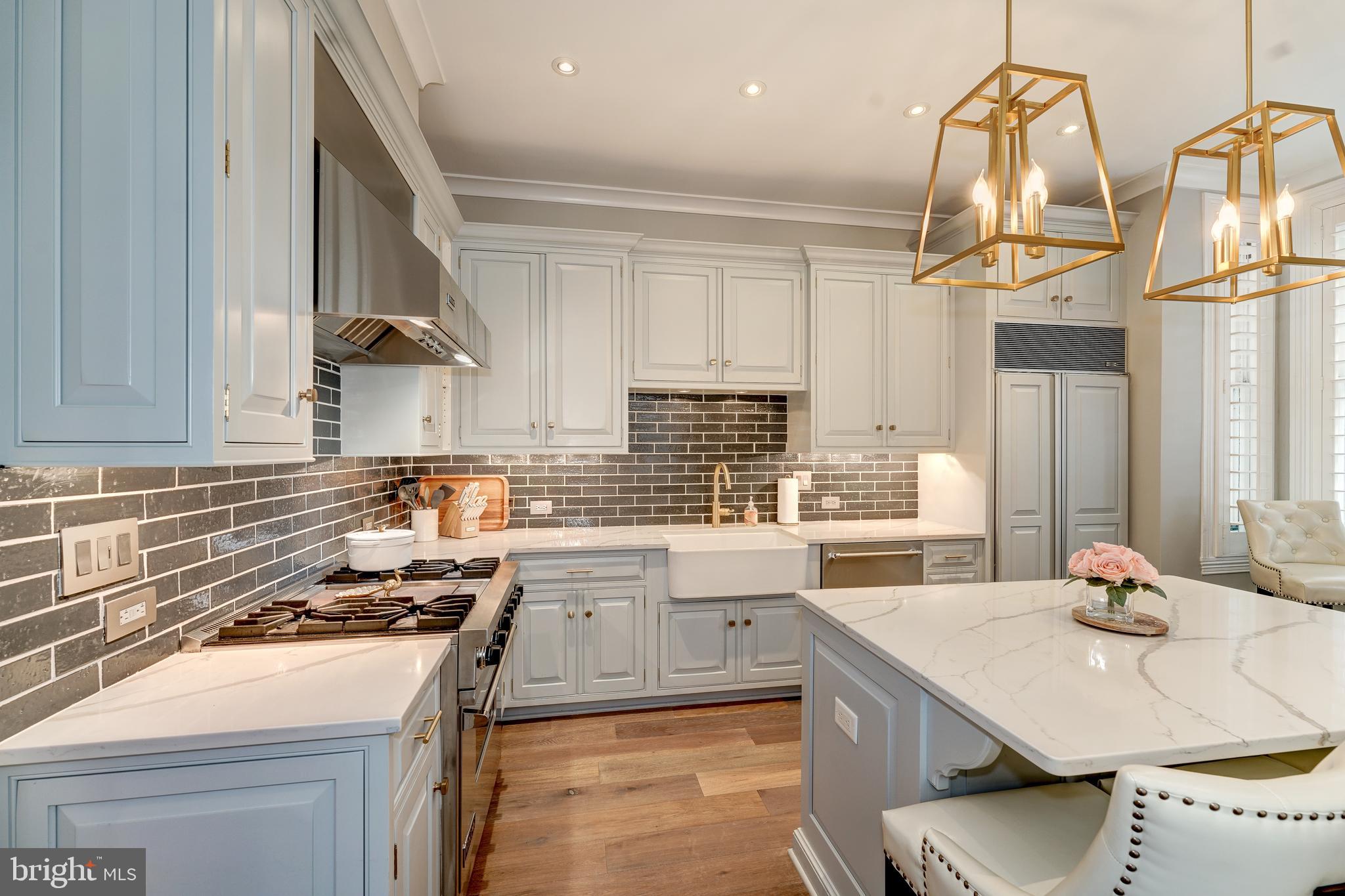 1237 29th Street Northwest Washington, DC 20007 - Photo 9 of 37 Under-cabinet lighting,farmer's sink&island!