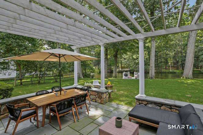 21 Woods Grove Road Westport, CT 06880 - Photo 19 of 38 Entertain in the backyard by the River.