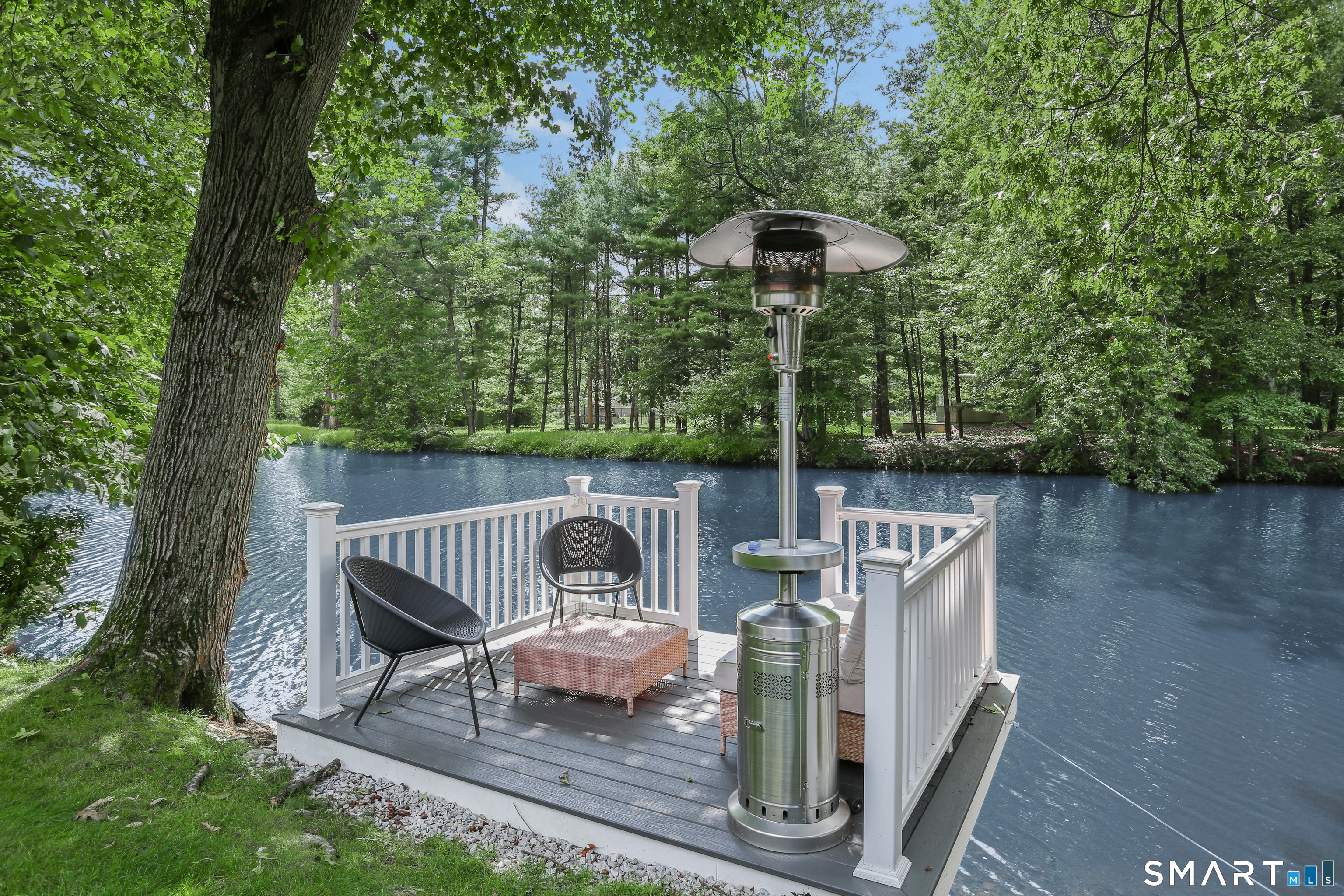 21 Woods Grove Road Westport, CT 06880 - Photo 3 of 38 This fantastic deck has a swim ladder to as a kayak launch or to swim. ALso an ideal place to entertain or just enjoy the quiet.