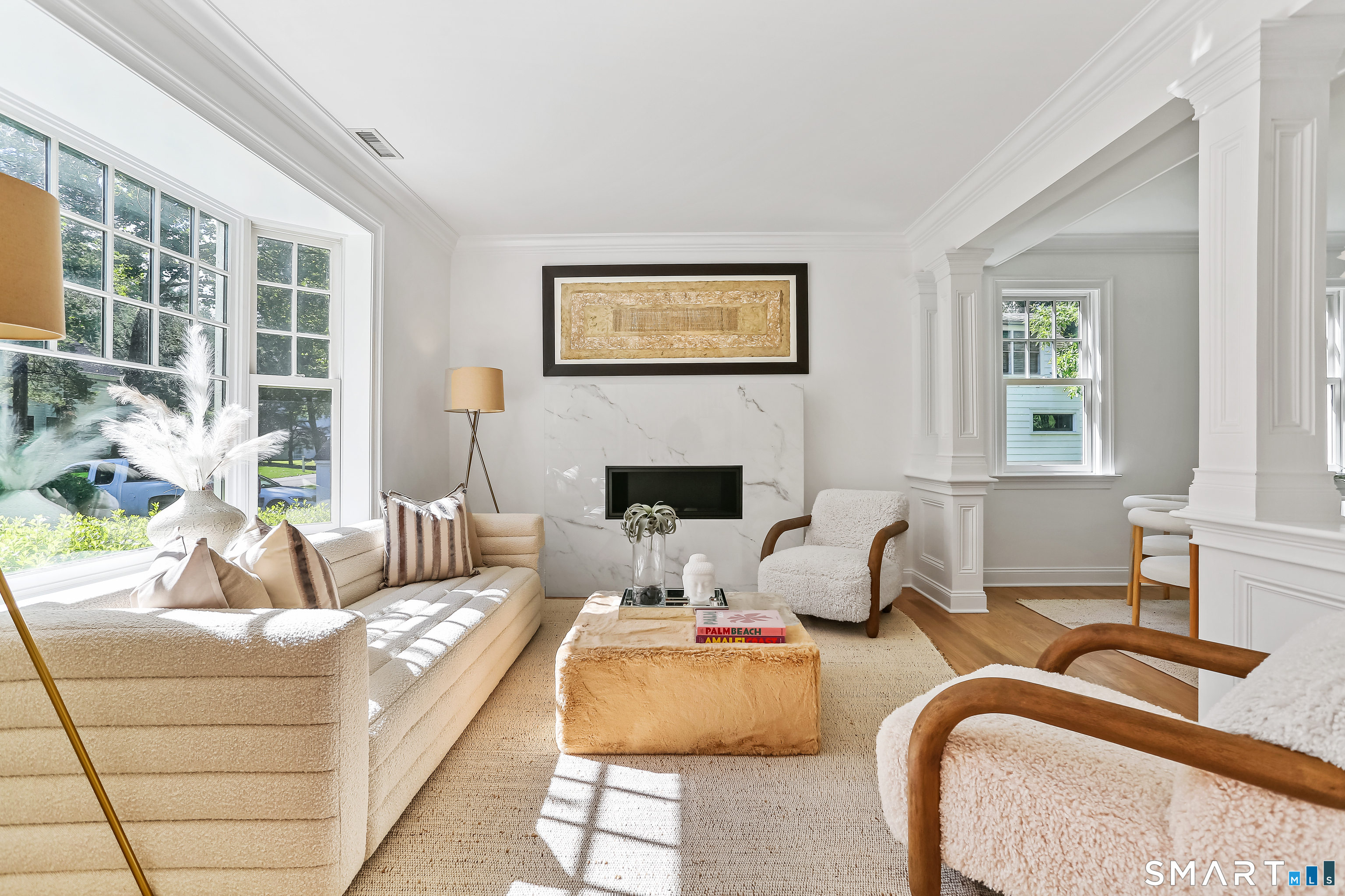 21 Woods Grove Road Westport, CT 06880 - Photo 6 of 38 The Living Room, with 9" ceilings, has a bay window and gas fireplace.
