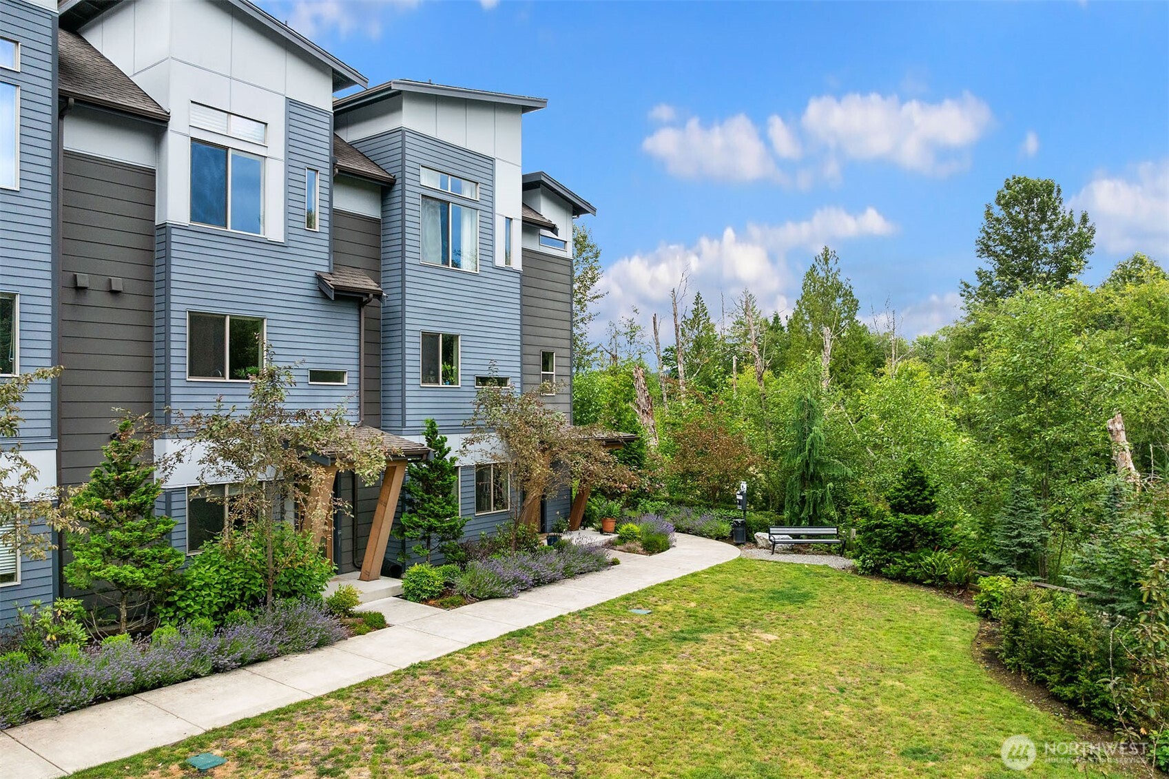 1910 Riva Lane Northwest Issaquah, WA 98027 - Photo 1 of 31 a front view of a house with a yard