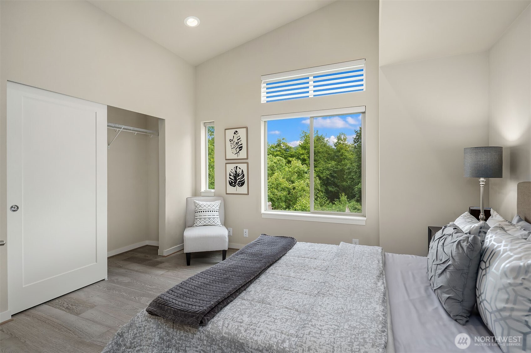 1910 Riva Lane Northwest Issaquah, WA 98027 - Photo 14 of 31 a bedroom with a bed and a window