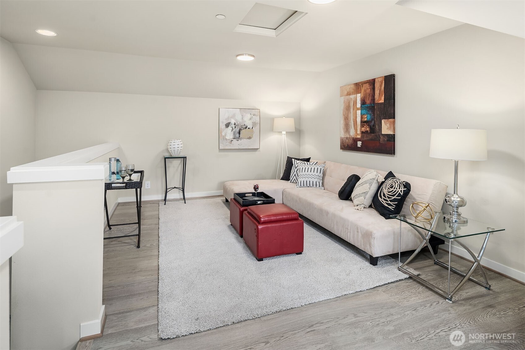 1910 Riva Lane Northwest Issaquah, WA 98027 - Photo 19 of 31 a living room with furniture and a wooden floor