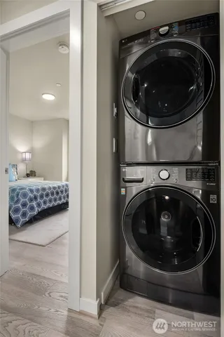 a bathroom with a washing machine and dryer