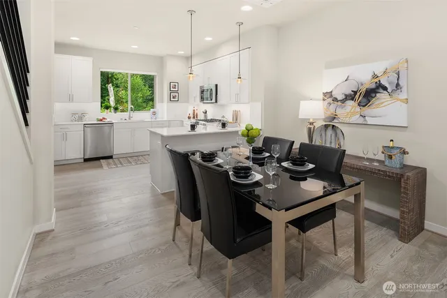 a view of a dining room with furniture