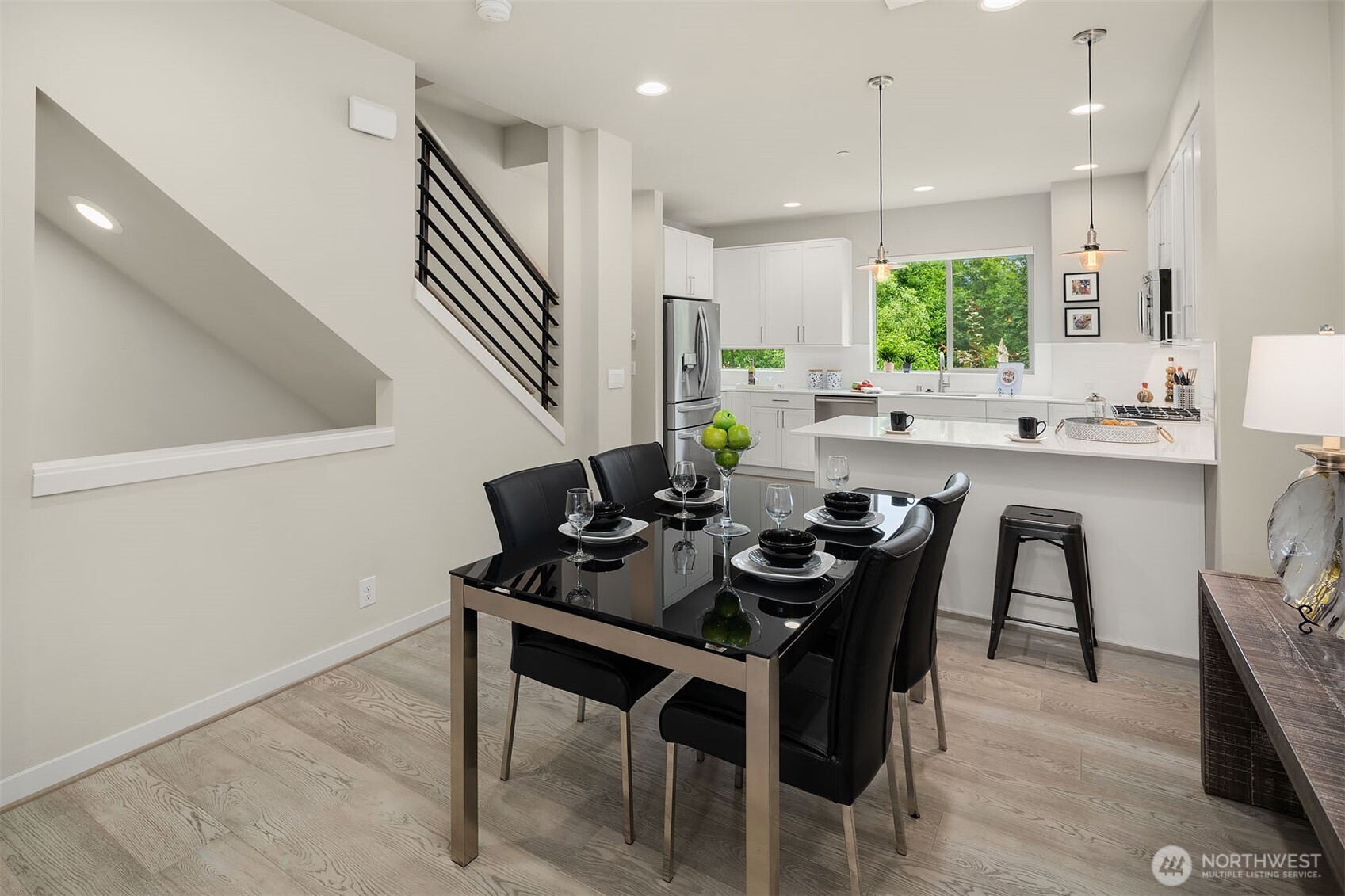 1910 Riva Lane Northwest Issaquah, WA 98027 - Photo 9 of 31 a dining room with furniture and window