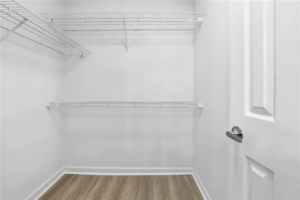 a view of a room with racks on the wall