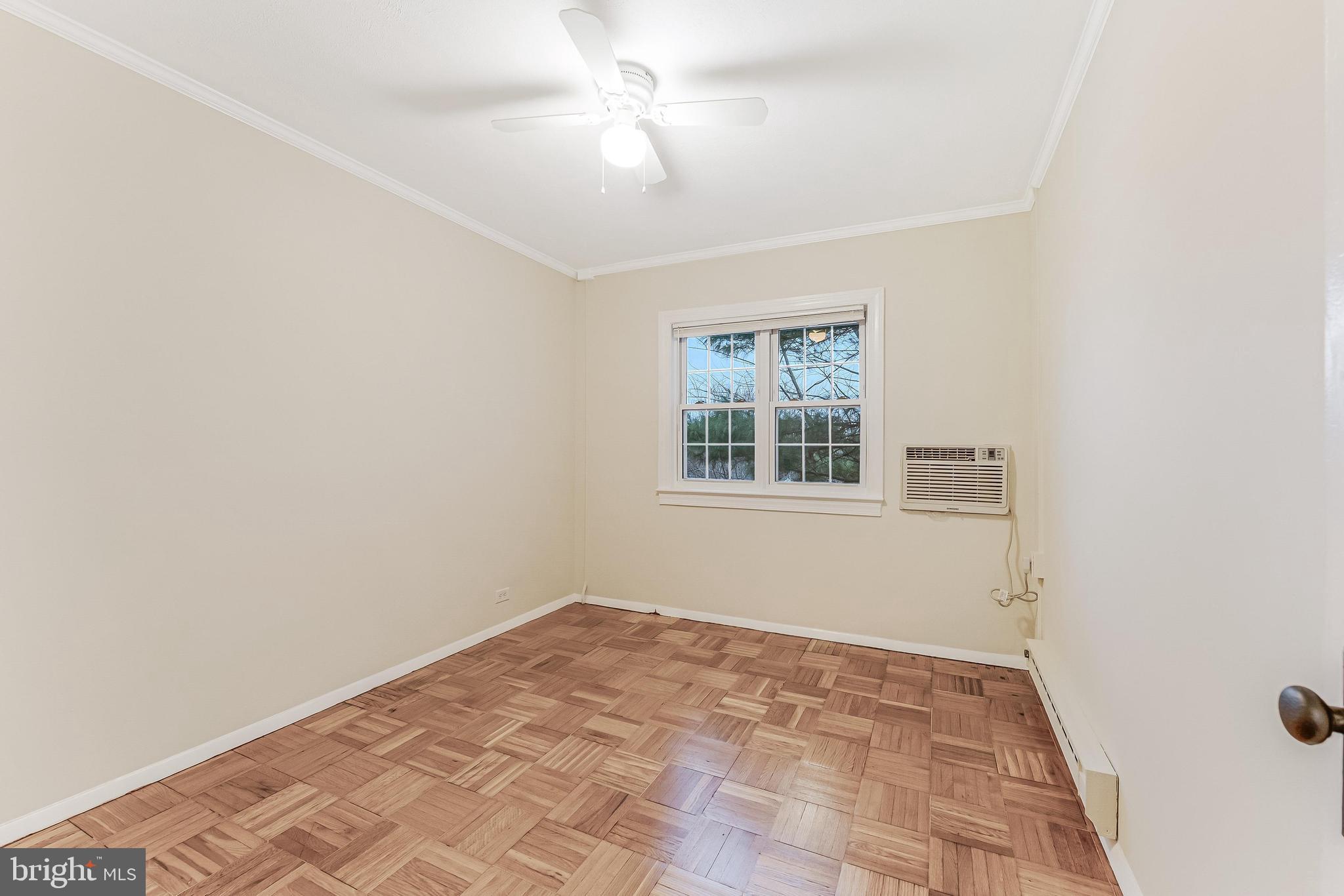 3228 Wellington Road Alexandria, VA 22302 - Photo 19 of 20 an empty room with windows and fan