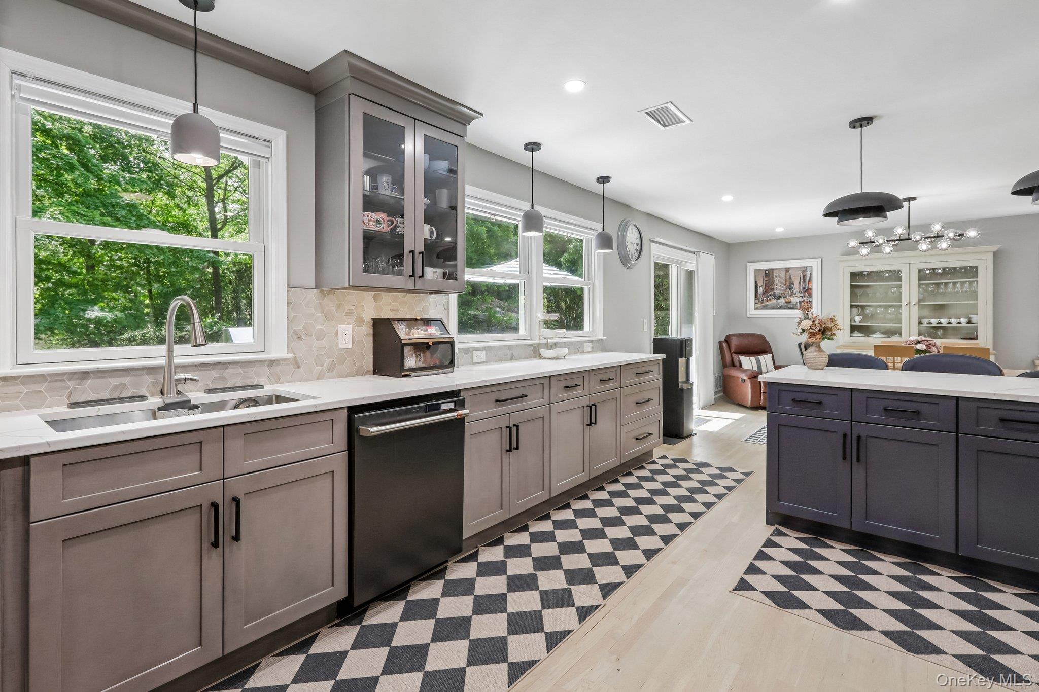 62 Mohegan Road Larchmont, NY 10538 - Photo 27 of 46 a kitchen with sink cabinets and window