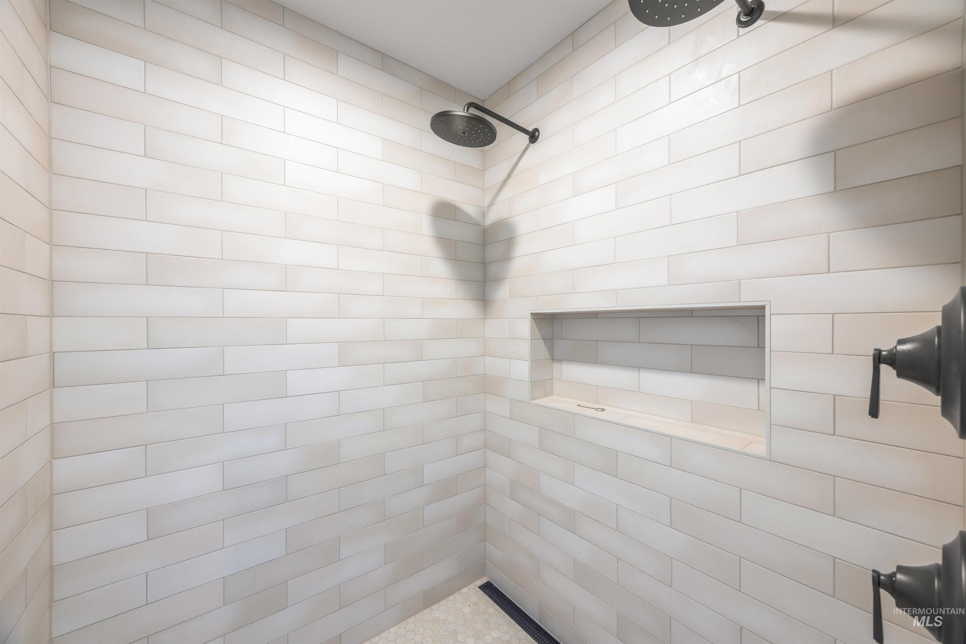 10968 North Elk Ridge Place Boise, ID 83714 - Photo 27 of 49 Full bathroom featuring a tile shower