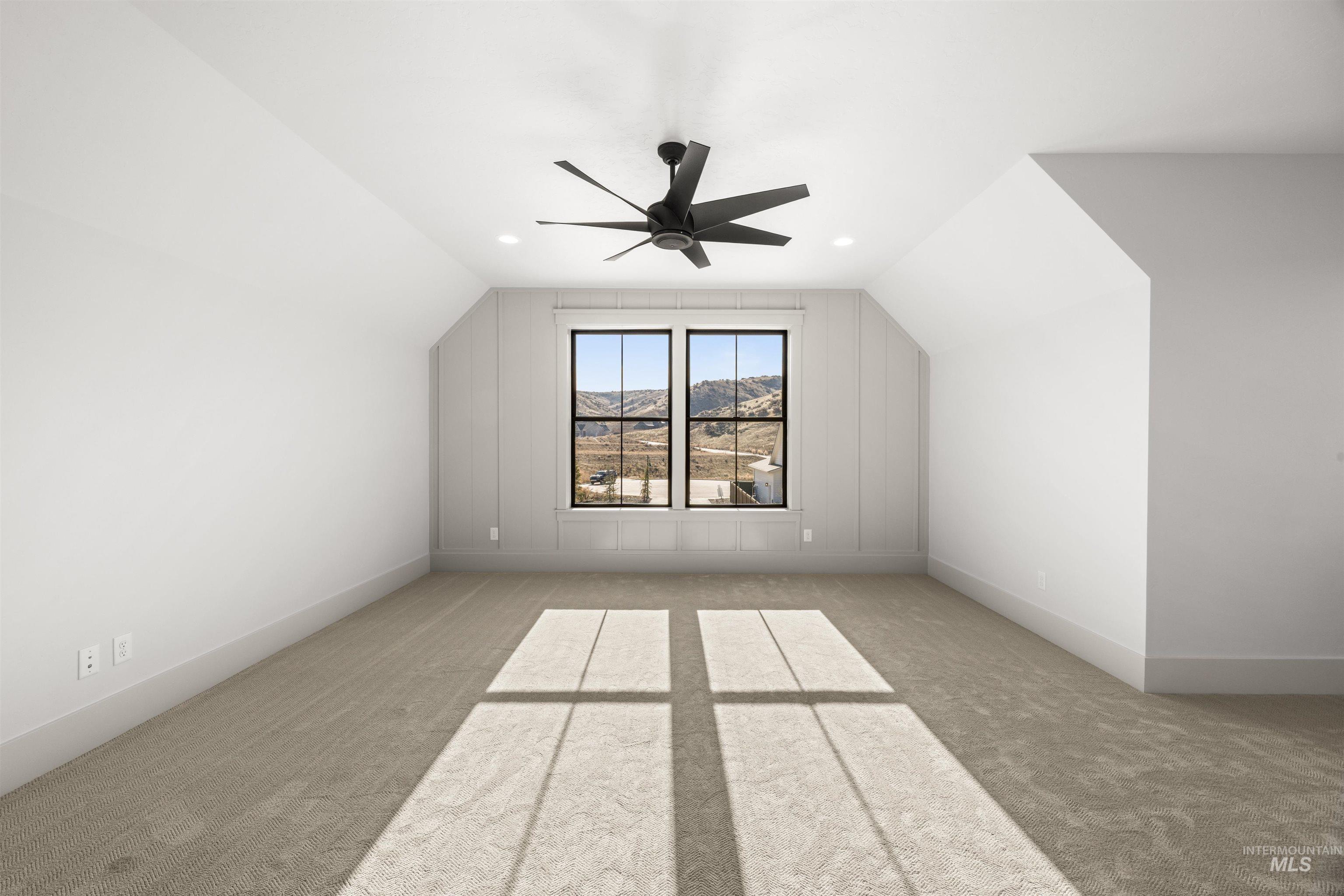10968 North Elk Ridge Place Boise, ID 83714 - Photo 32 of 49 Additional living space featuring light colored carpet, a ceiling fan, and recessed lighting