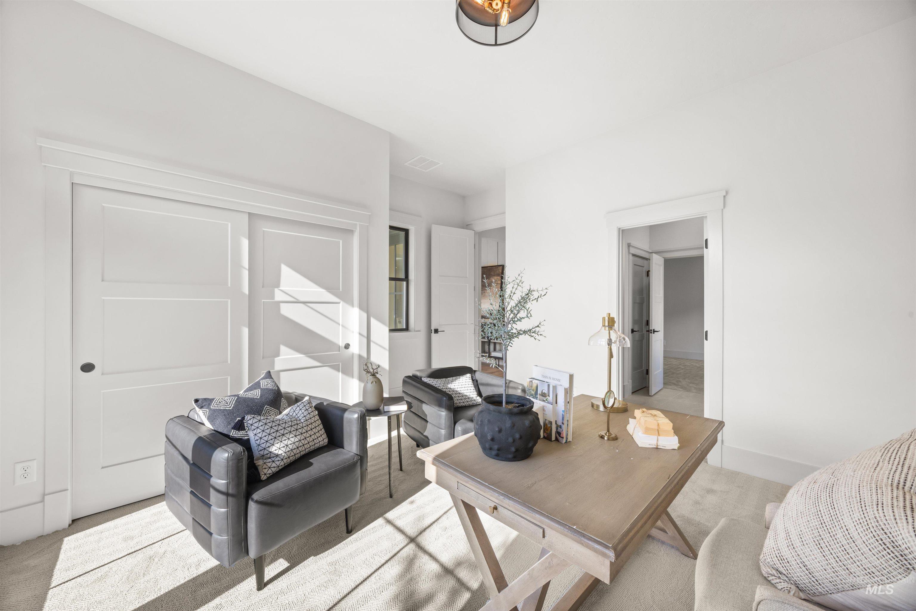 10968 North Elk Ridge Place Boise, ID 83714 - Photo 36 of 49 Home office with carpet floors and baseboards