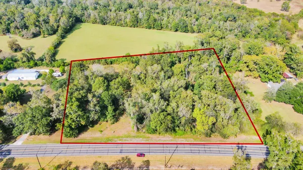 a view of a yard with an outdoor space