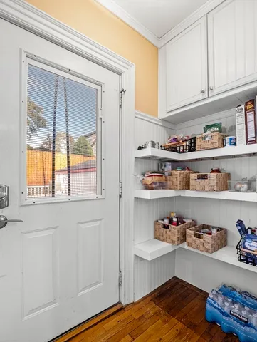 a bedroom with a bed and closet