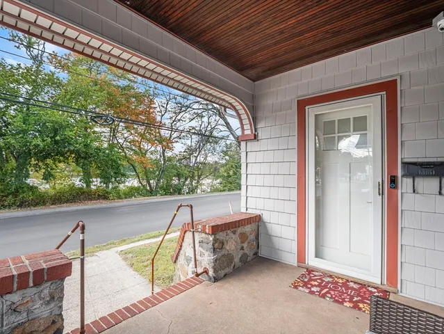 a view of a two chairs in the balcony