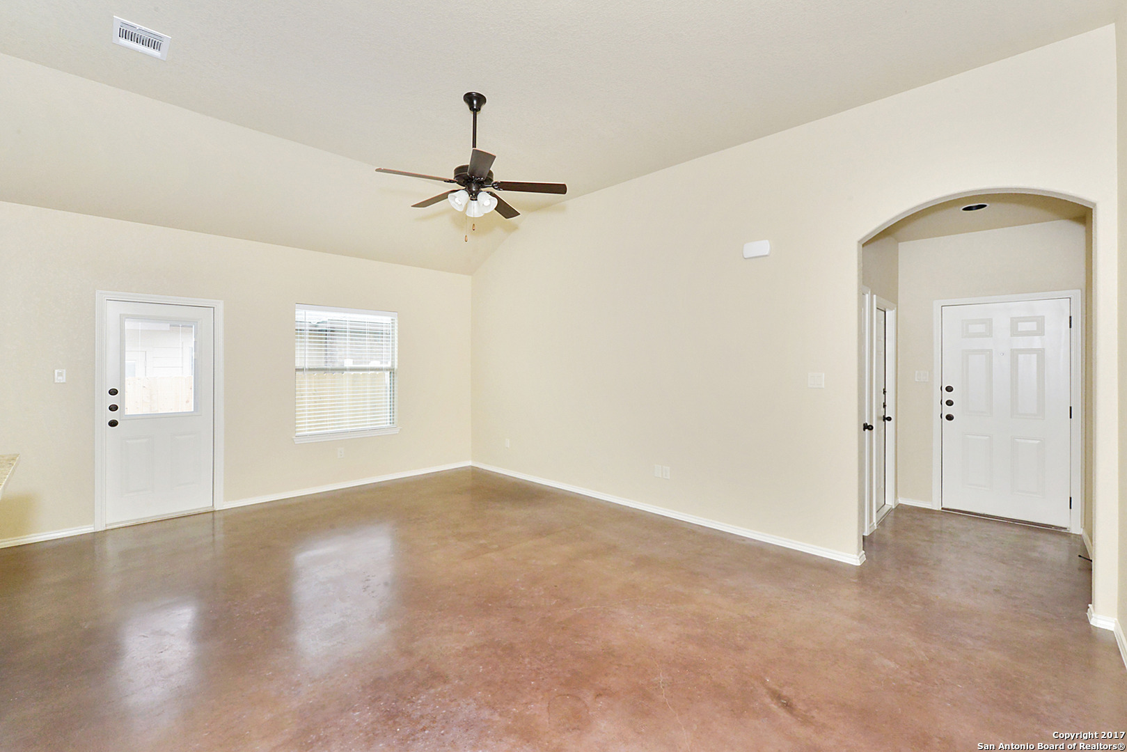 2557 Pahmeyer Road New Braunfels, TX 78130 - Photo 7 of 25 wooden floor in an empty room with a window