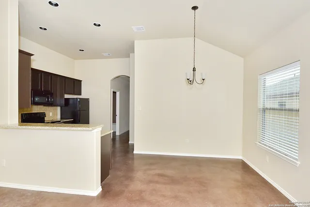 a view of a kitchen with a sink
