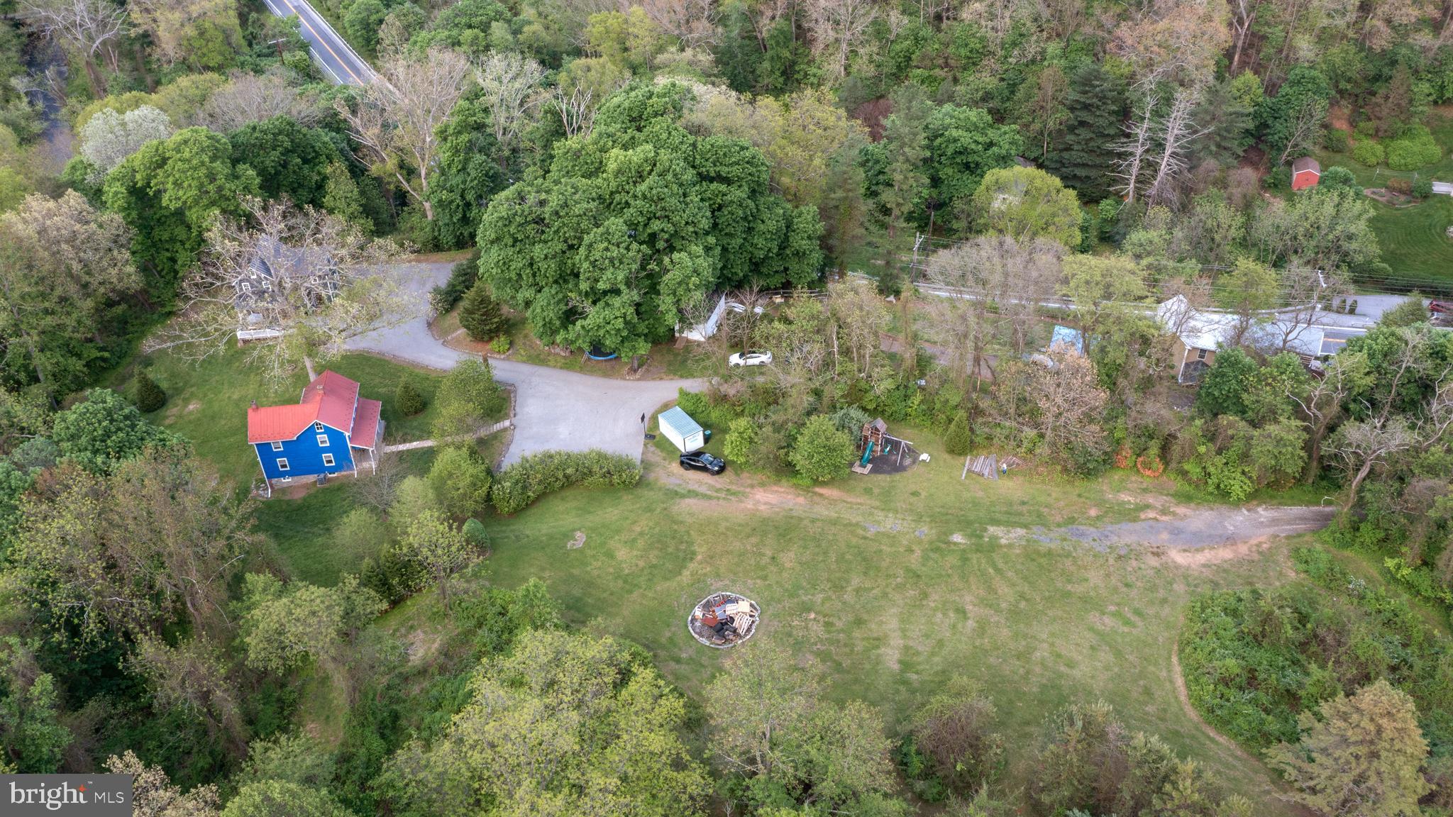 18708 York Road Parkton, MD 21120 - Photo 4 of 59 an aerial view of residential house with outdoor space and trees all around