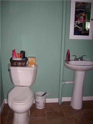 283 Brushy Road Centerville, TN 37033 - Photo 12 of 20 Half bath in utility room, stack washer and dryer included.